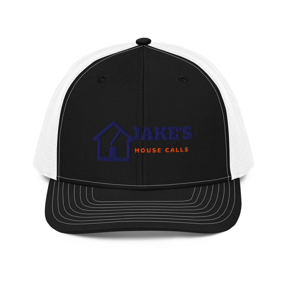 Richardson 112 trucker, cream foam front with navy mesh, the house mark and JAKE'S HOUSE CALLS